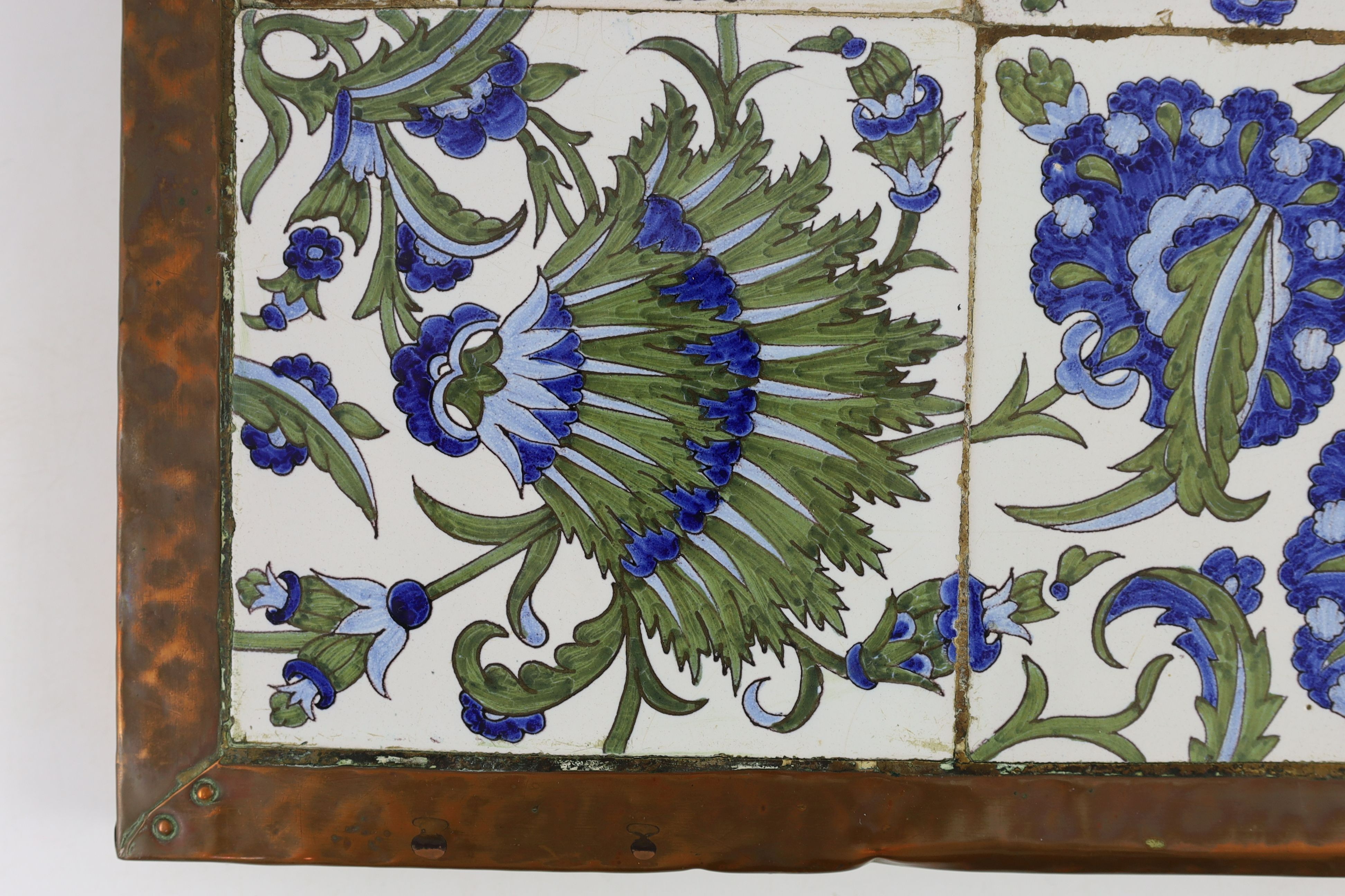 An Arts and Crafts de Morgan style 4 tile panel - 36 x 36cm